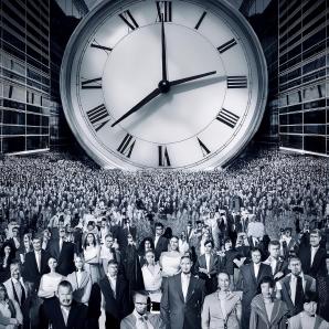 A crowded dystopian space, crammed with office drones, in front of a colossal clock