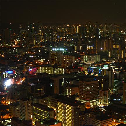 A night scene of Singapore. SKyscrapers lit only by their windows
